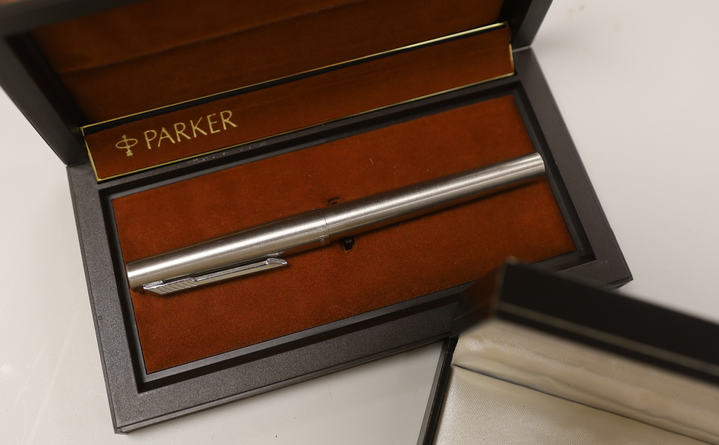 A cased Montblanc ball point pen and a Parker 105 pen
